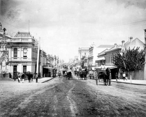 Queen Street featuring horses and carriages