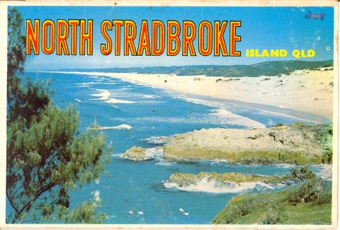 color cover of postcard book. picture of South Gorge and Main Beach. 