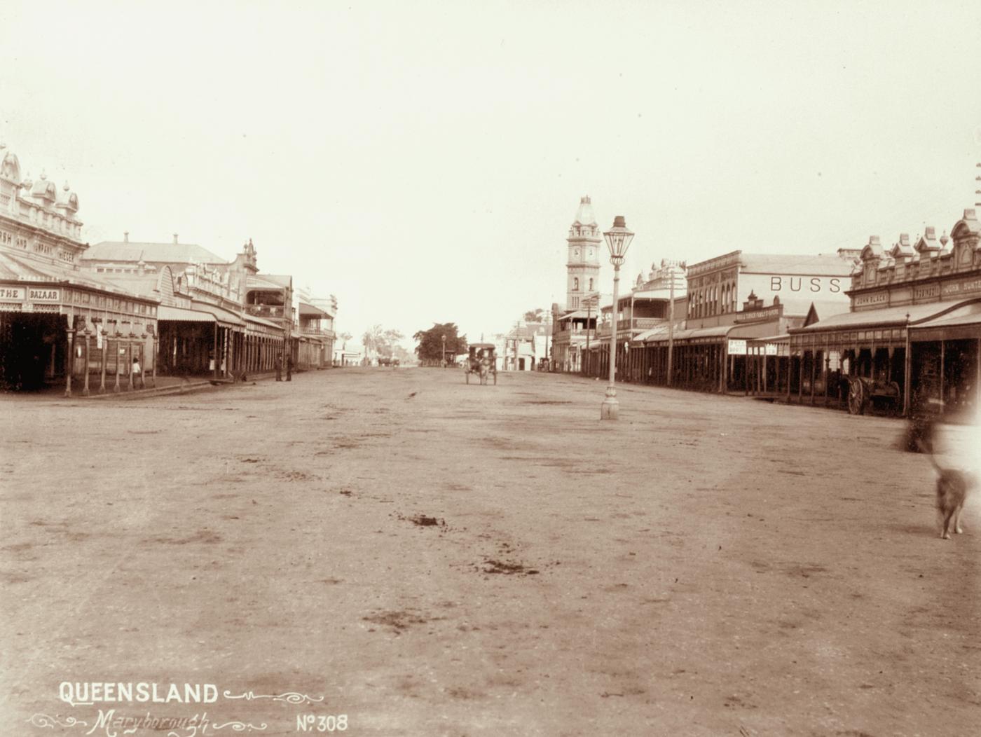 View of Bourbong Street, Bundaberg, c1897 featuring Post Office and buildings