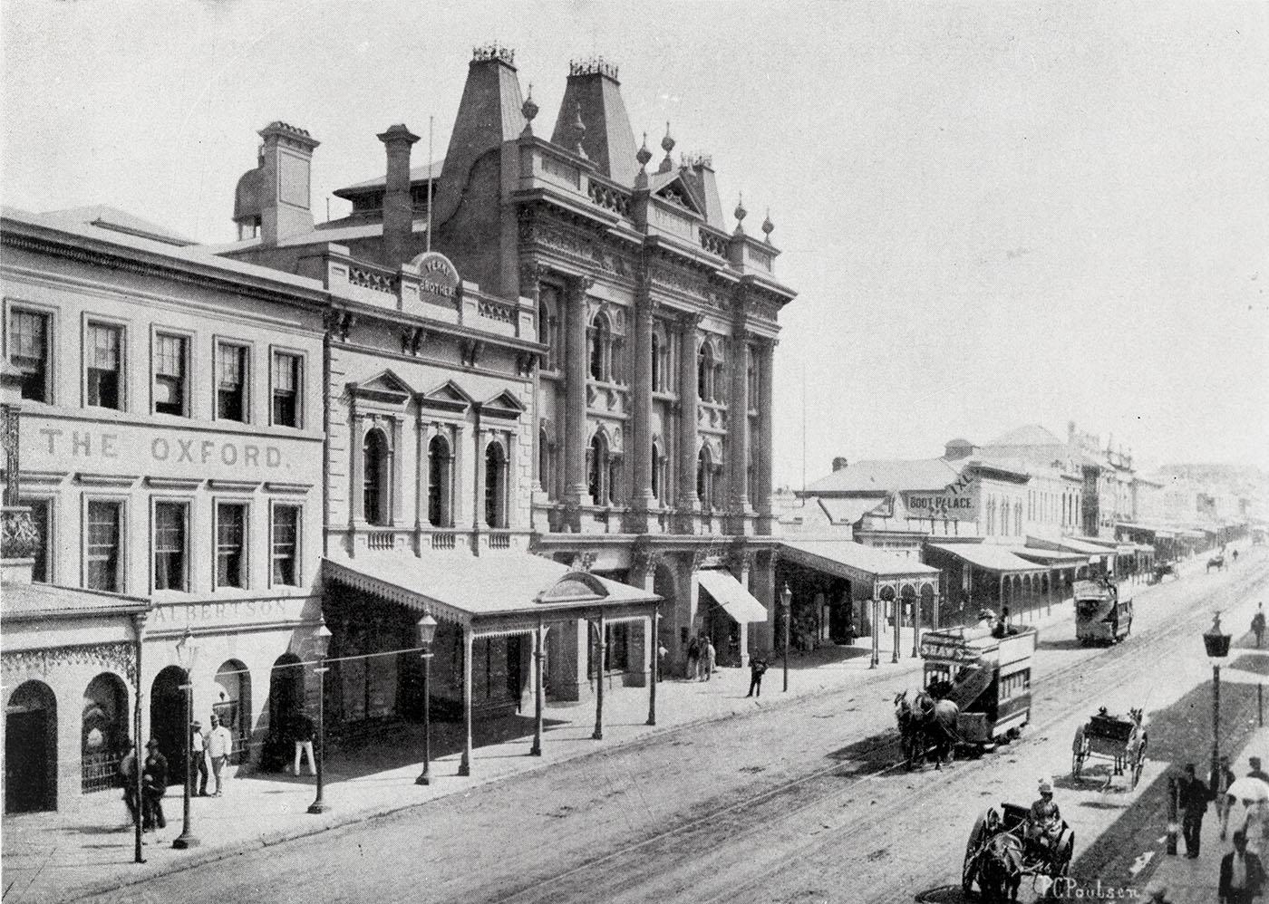 View of Queen street with horse-drawn trams in front