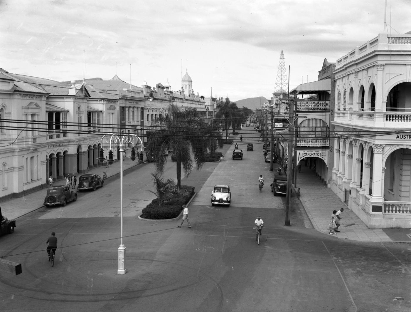 View of the main street of Townsville with people gathered on the street